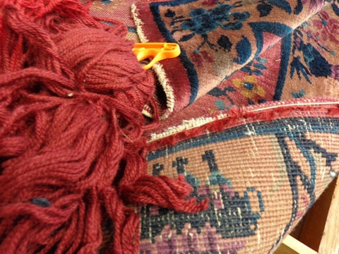 Edge wear on Oriental rug