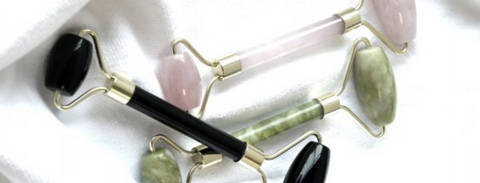 3 Facial Rollers on white background: Rose Quartz, Black Obsidian and Green Jade