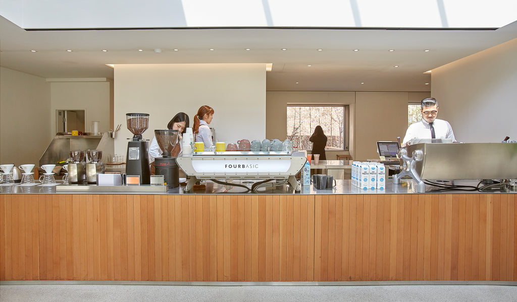 a view of the bar in the new store, with acaia scales on the left hand side. 