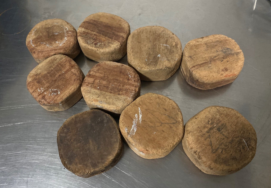 wooden hockey pucks hand carved