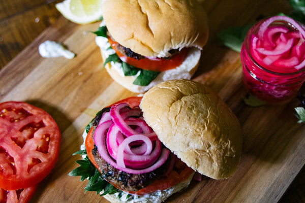Lamb Burgers with Feta Tzatziki and pickled red onions