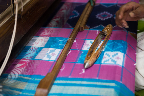 Image of colourful fabric weaving