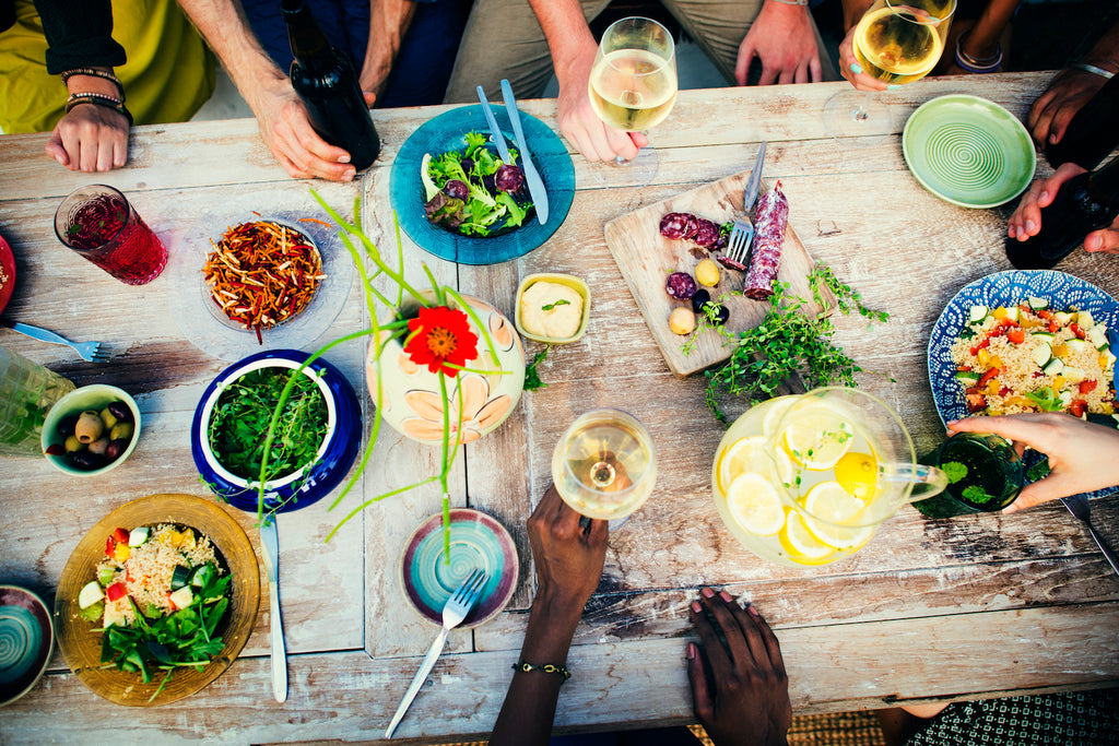 Cookery chefs serve a dinner party