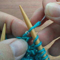 Adding beads to knitting 7