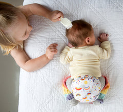 Baby in Grovia Rainbow cloth diaper