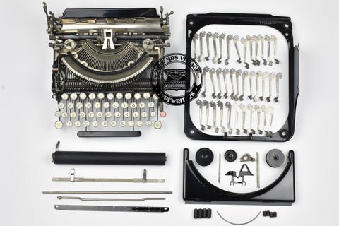 fully dismantled typewriter 