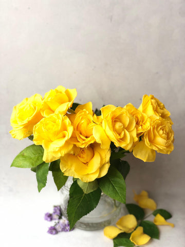 yellow roses peonies arrangement