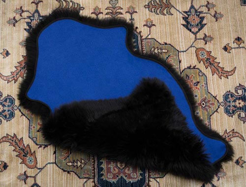 Black sheepskin with bright blue fabric lining