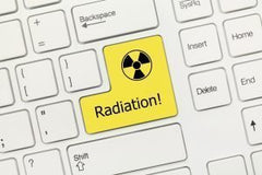 white-conceptual-keyboard-radiation-yellow-key-300x200
