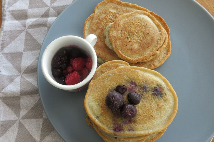 6 ingredient almond flour crumpets with frozen blueberries on the side