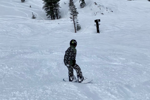 shred dog kid snowboarding