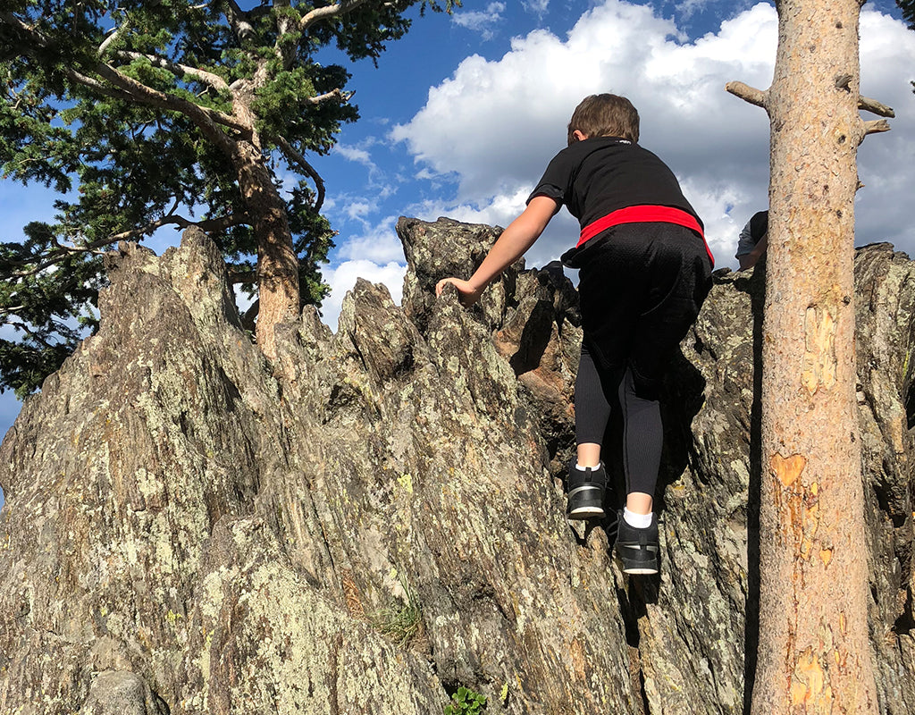 scrambling on rocks in colorado