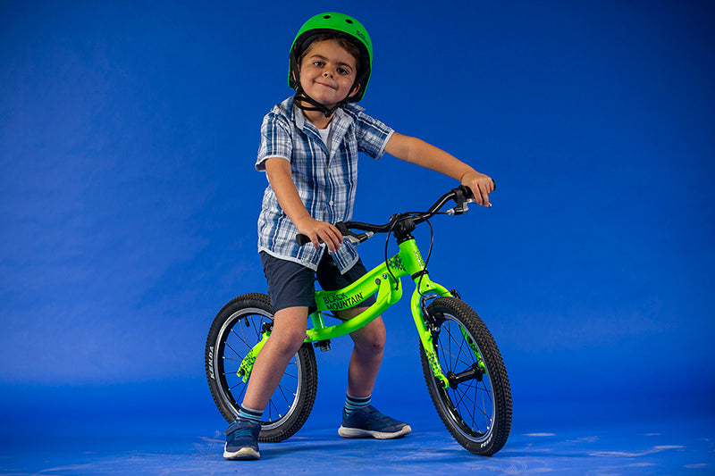 5 year old boy on a balance bike