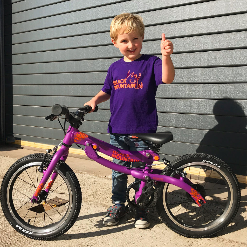4 year old boy with bike