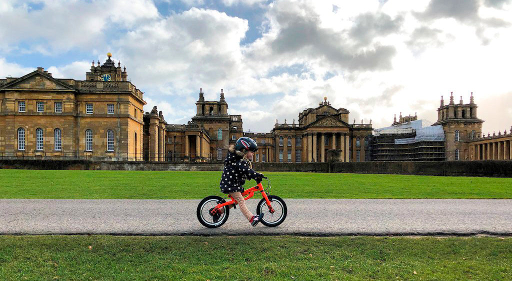 One of our customers riding a balance bike