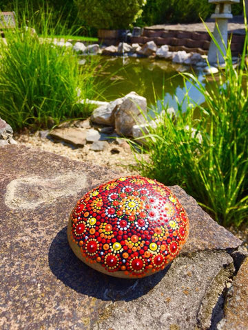 mandala red dots painted rocks meditation nature energy