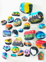 painted rocks beach themes students in Honduras
