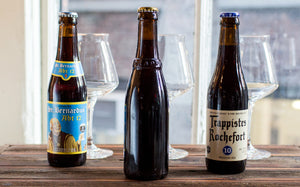 From left to right: St. Bernardus Abt 12, Westvleteren 12, and Rochefort 10 Belgian Dark Strong Ale beers