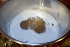 Eventually the foam starts to fall back into the wort and we are left with a vigorous boil