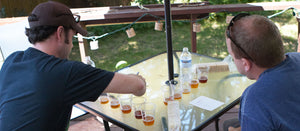 Brewers tasting samples of IPAs
