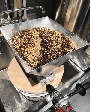 Milling grain in The Electric Brewery