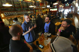 Vinnie Cilurzo talks hops with customers on the first day of release of Pliny in 2016