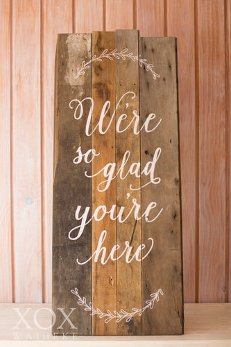 Wooden Sign “We’re so glad you’re here” free standing