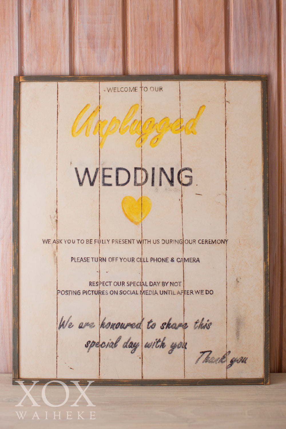 Sign “Welcome to our Unplugged Wedding”