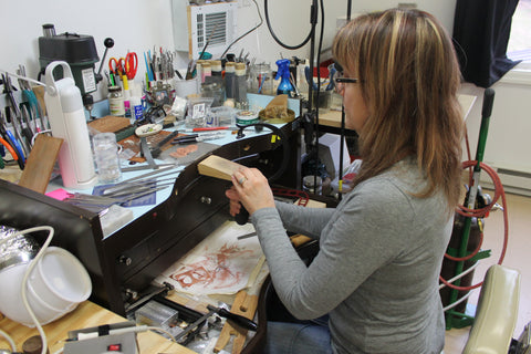 Tracy Hibsman making jewelry that touches the soul.  In the studio at the bench.