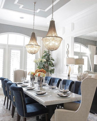 double imperio chandelier over elegant dining table