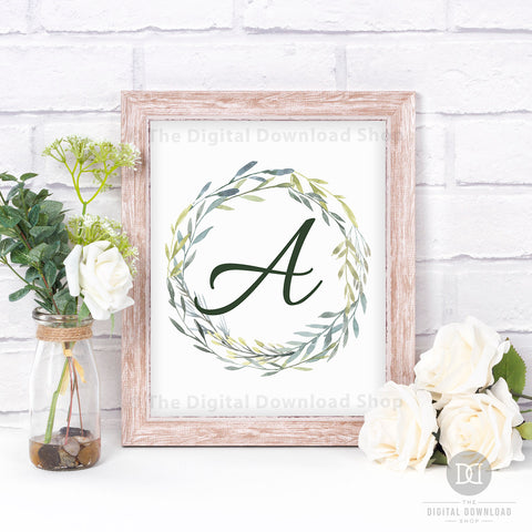 Watercolor Greenery Monogram Wall Art Free Printable- Add a personal touch to your home's decor with this monogram wall art free printable with watercolor greenery! This would look gorgeous in any room of your home! | #freePrintable #freePrintables #wallArt #monogramWallArt #DigitalDownloadShop