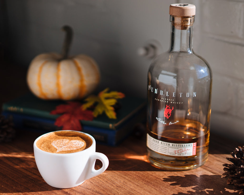 An Eggnog Cappuccino topped with nutmeg (pay no mind to the near empty bottle of Pendleton Whiskey) - Lifestyle