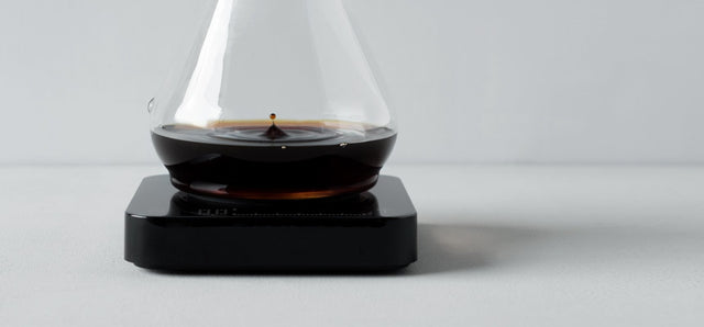 Acaia Pearl S in black with a Chemex coffee maker, Clive Coffee - Lifestyle