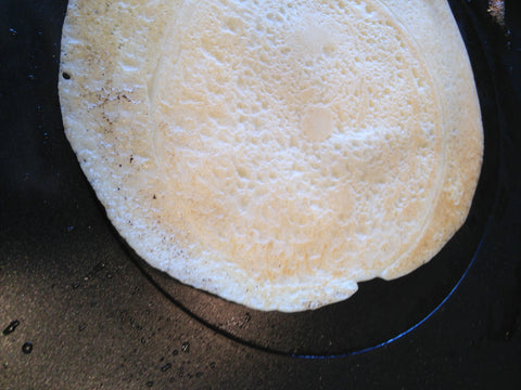 Crepe ready to transfered from the raclette grill top to the plate