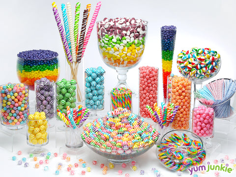 Rainbow candy buffet featuring candy by color from YumJunkie!