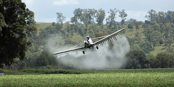 Plane spraying pesticides
