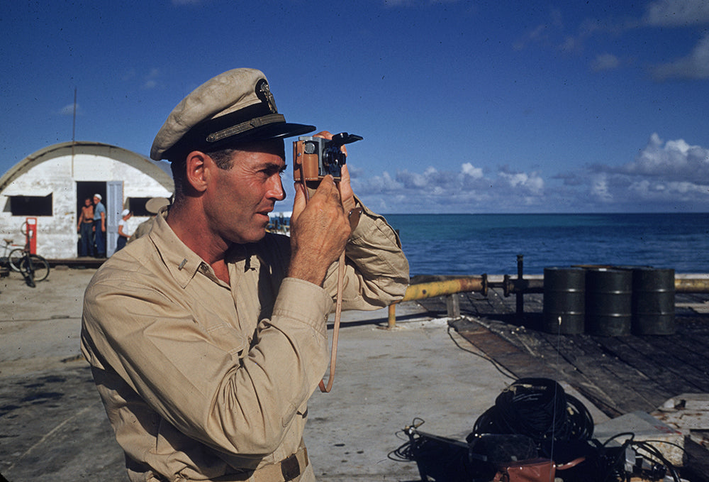 ic: 1955: Film star Henry Fonda (1905 - 1982) does some personal camera work while on location for Mister Roberts in which he played the part of Lt Doug Roberts.