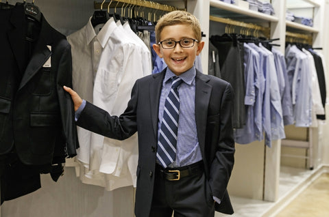 10-year-old Flynn shows off his dapper duds at Brooks Brothers. By Annie Wermiel
