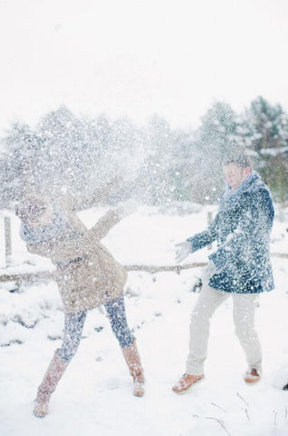 fun christmas traditions for couples snow fight