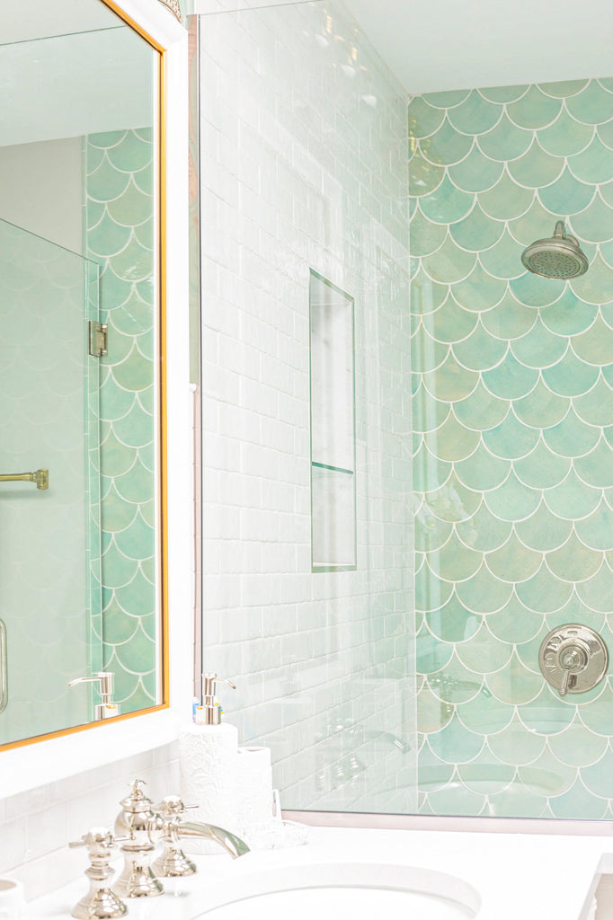 Light teal fish scale tile shower