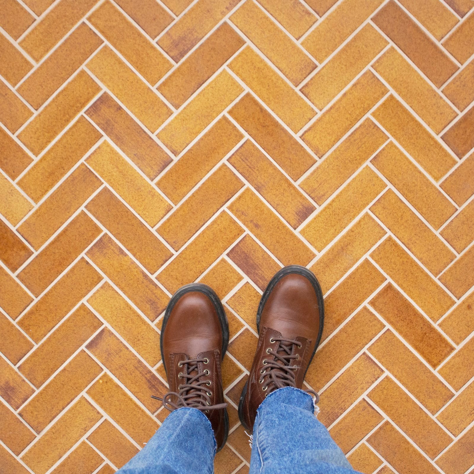 Orange Herringbone Tile Floor