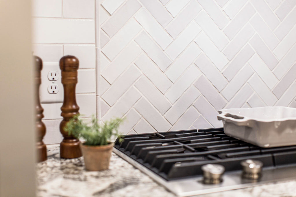 white herringbone kitchen tile