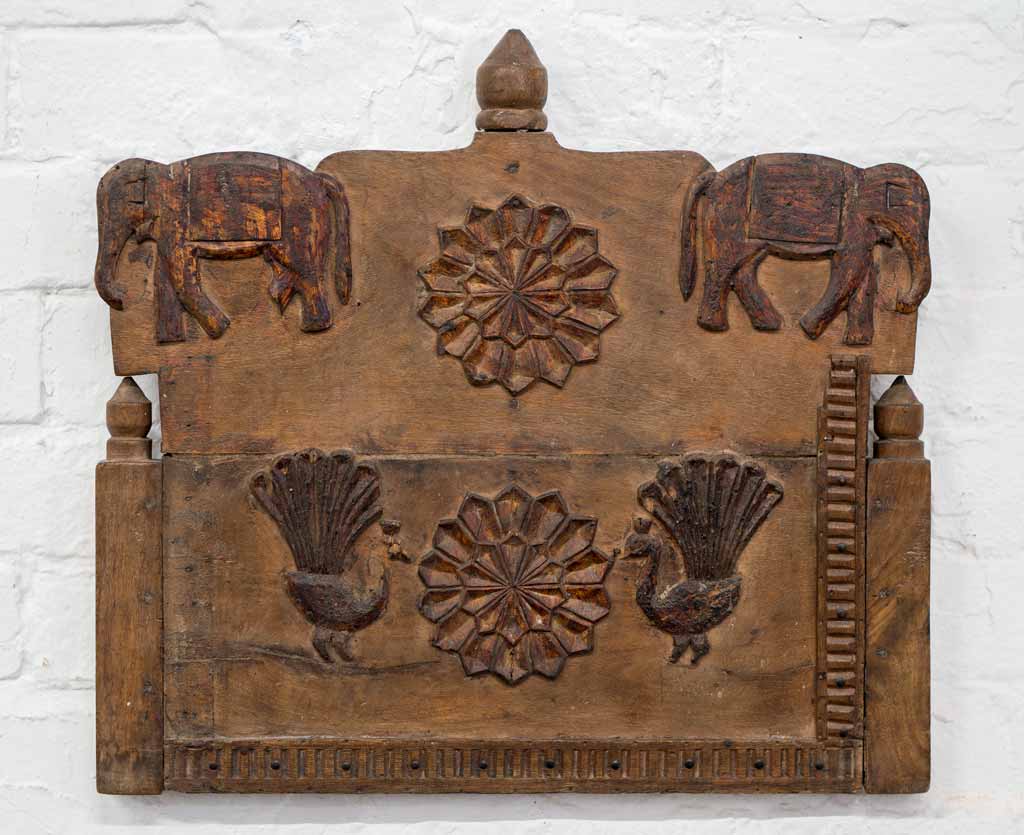 Carved Wooden Panel with Elephants and Peacocks
