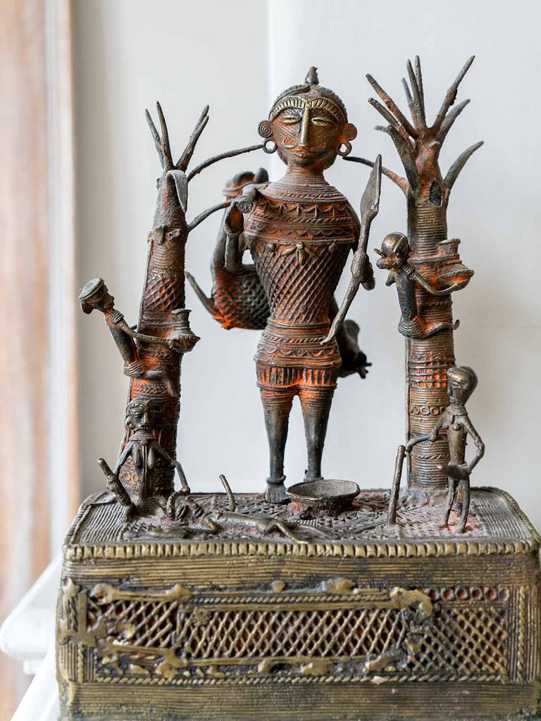 Brass Sculpture of a Hunter and Villagers 1