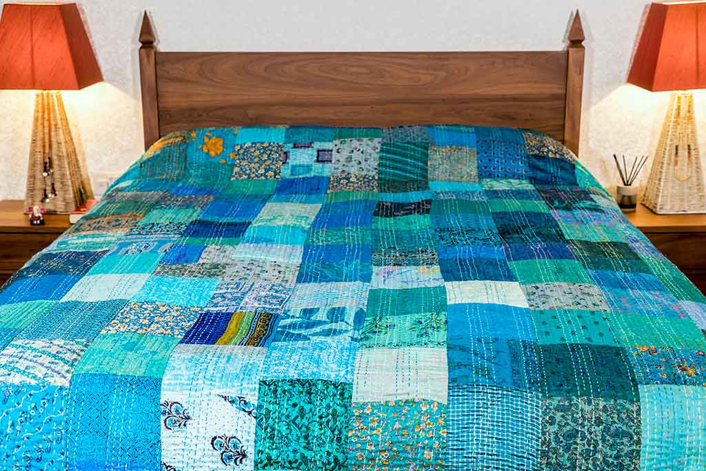 Kingfisher blue silk patchwork bedspread