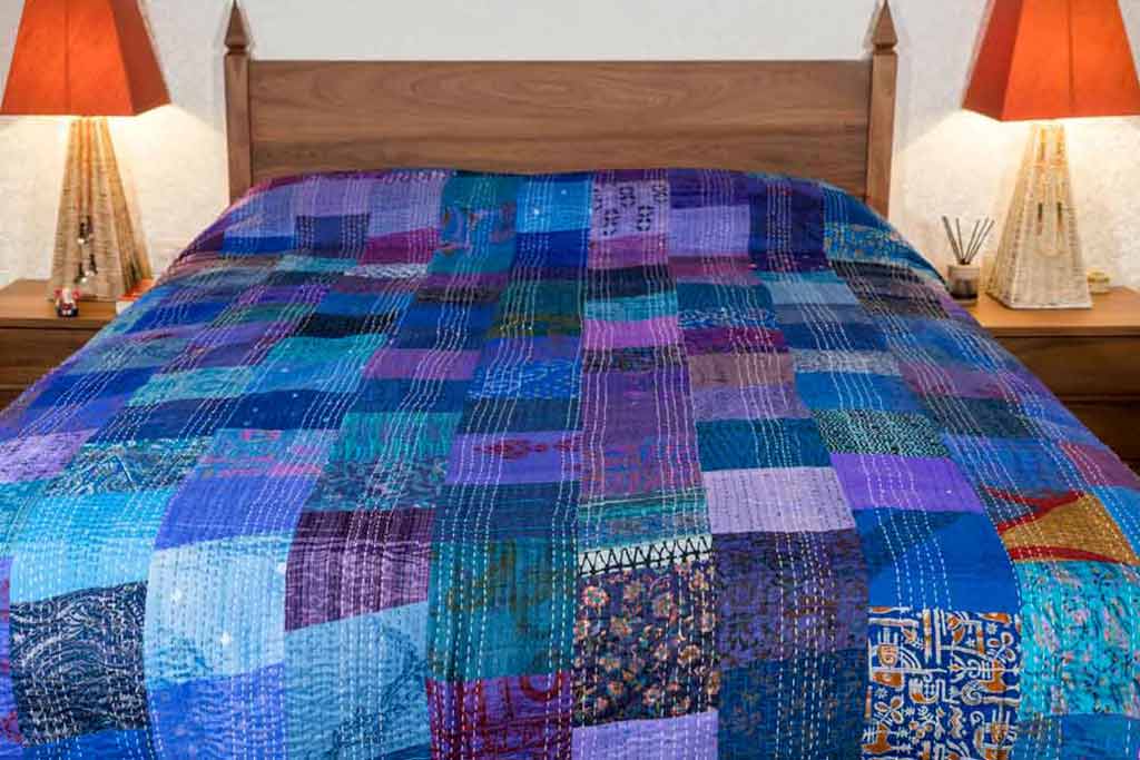 Vibrant blue silk kantha patchwork bedspread