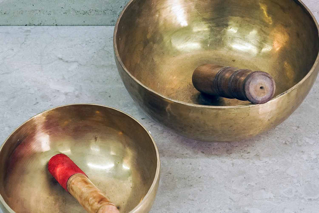 Two Tibetan Singing Bowls with Strikers