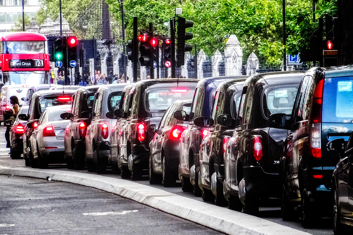 Queue of London taxis, traffic