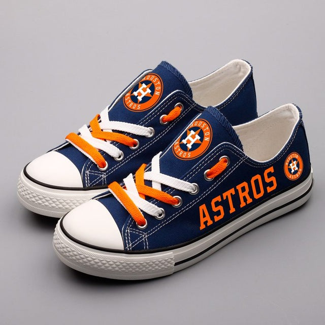 orange astros converse