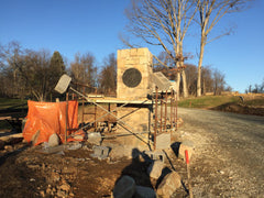 photo of stone gate posts in construction